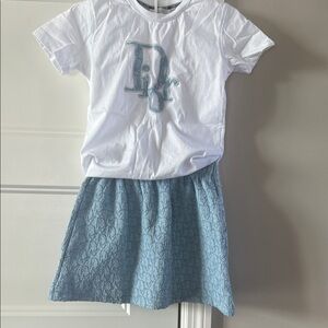 Dior White Tee and Light Blue Skirt Ensemble